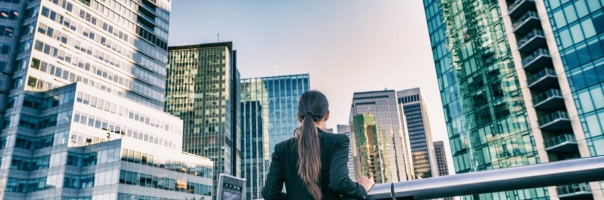 Woman with buildings